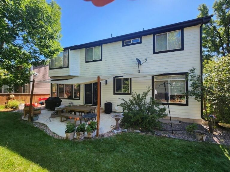 Roofing and exterior company repaired roof, gutters and paint on this home in Highlands ranch, colorado