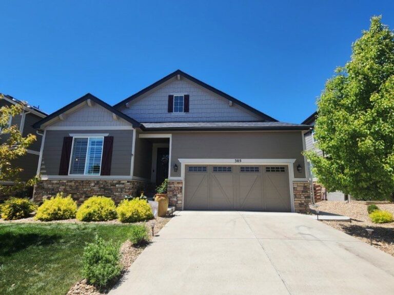 Roofing and exterior company repaired roof, gutters and paint on this home in erie, colorado