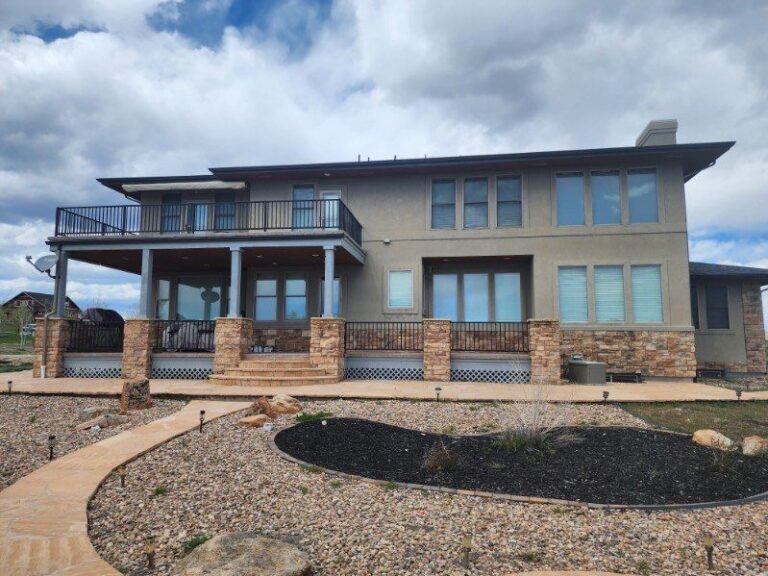 Roofing and exterior company repaired roof, gutters and paint on this home in castle rock, colorado