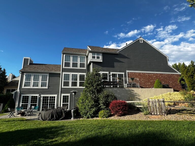 Roofing and exterior company repaired roof, gutters and paint on this home in highlands ranch, colorado