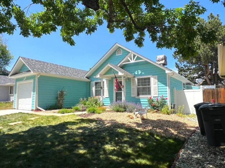 Roofing and exterior company repaired roof, gutters and installed siding on this home in aurora, colorado