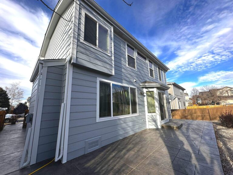 Roofing and exterior company repaired roof, gutters and paint on this home in castle rock, colorado