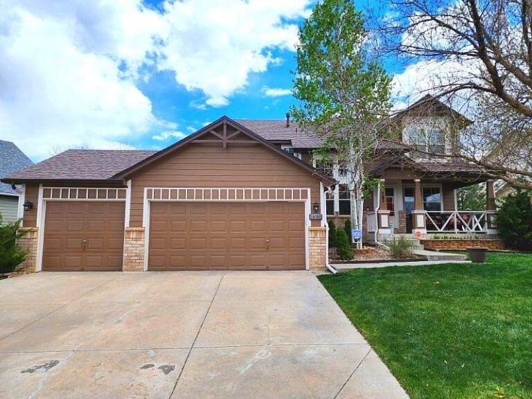 Roofing and exterior company repaired roof, gutters and paint on this home in castle rock, colorado