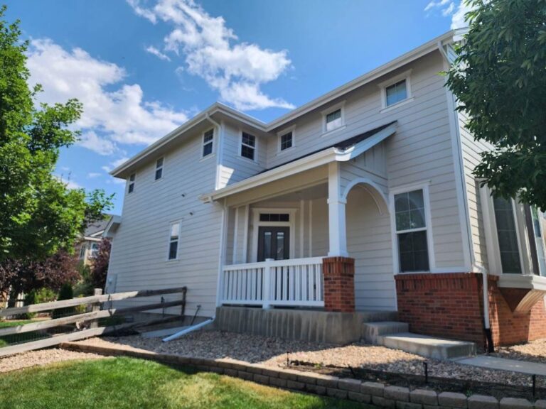 Roofing and exterior company repaired roof, gutters and paint on this home in aurora, colorado