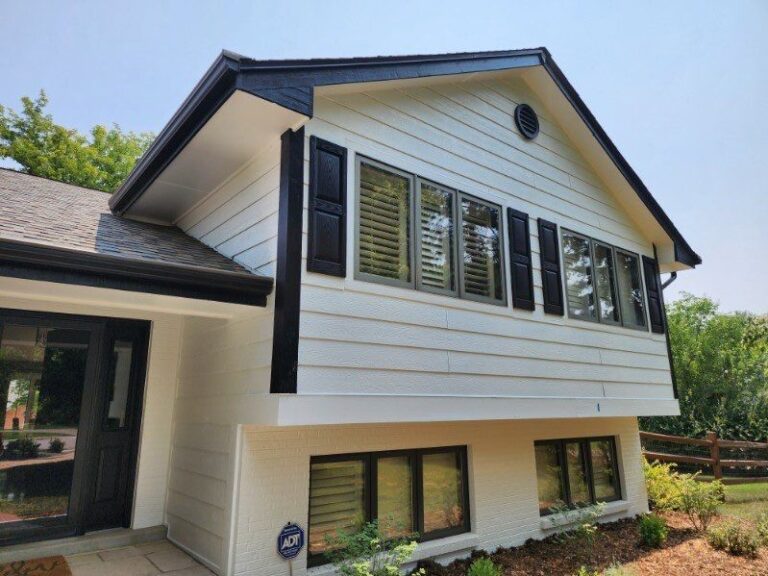 Roofing and exterior company repaired roof, gutters and paint on this home in littleton, colorado