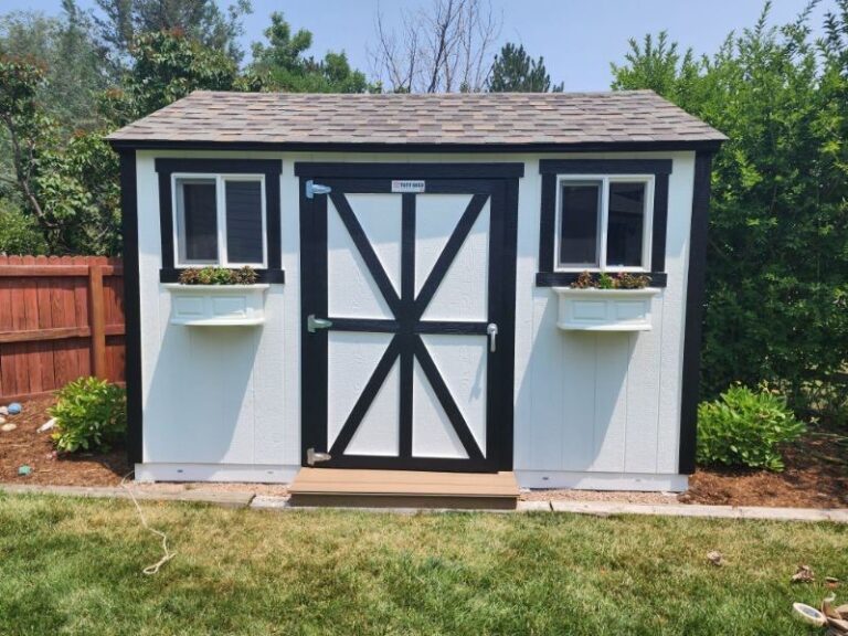 Roofing and exterior company repaired roof, gutters and paint on this home in littleton, colorado