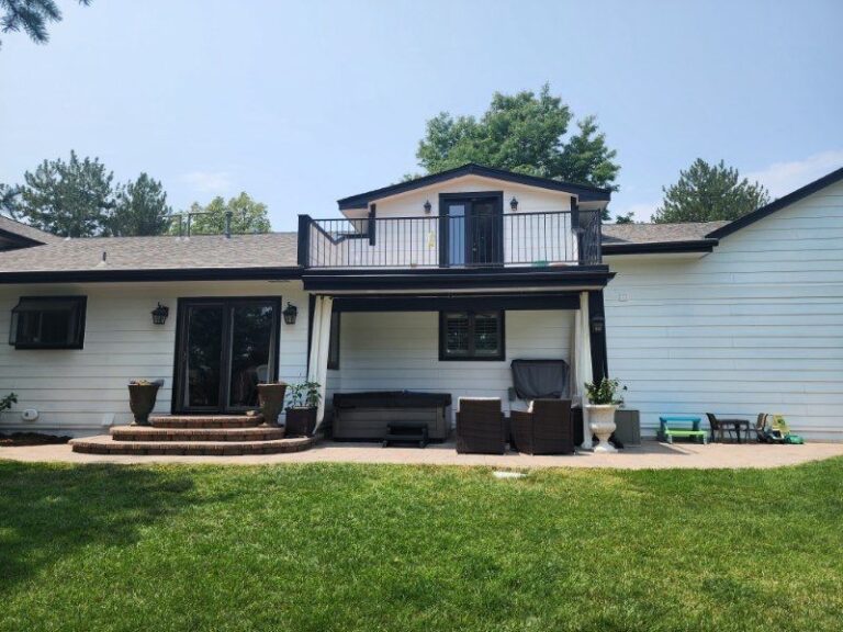 Roofing and exterior company repaired roof, gutters and paint on this home in littleton, colorado